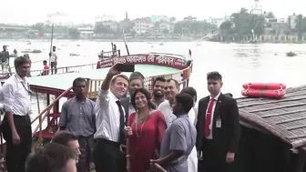 France's Macron samples local food in Bangladesh, takes boat trip | AFP