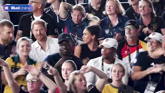 Meghan Markle sings along to Sweet Caroline - while Harry claps out of time at the Invictus Games