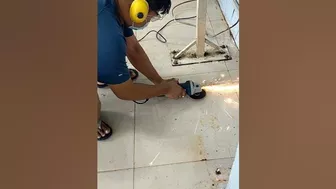 Cutting metal in a Garment Factory