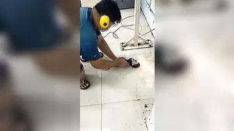 Cutting metal in a Garment Factory