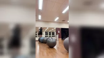 Man Hops From One Yoga Ball to Another - 1408462-6