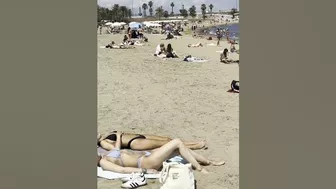 ???????? Sun bath at Barcelona beach