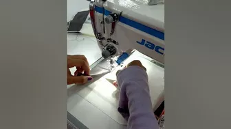 She's sewing single needle Machine