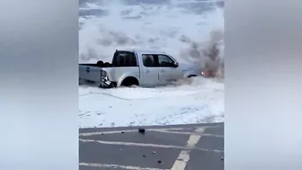 Sea spits mangled 4x4 truck out onto Devon beach following Storm Ciarán