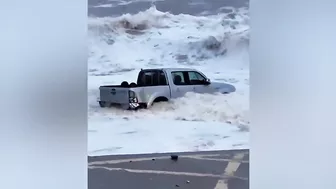 Sea spits mangled 4x4 truck out onto Devon beach following Storm Ciarán