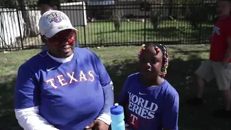 Rangers fans travel hours to pack Arlington's Entertainment District for World Series parade