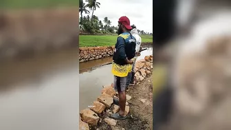 Catching fish from muddy stream