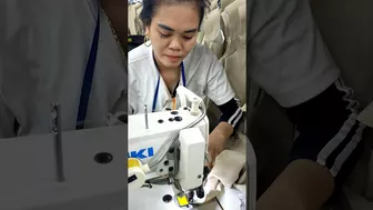 She's sewing Jackets in Garment Factory