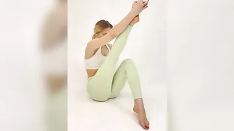 FLEXIBLE GIRL. STRETCH LEGS & FEET. YOGA FEET.