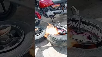 Stretching massive car tyre with fire technique ????????????????????????