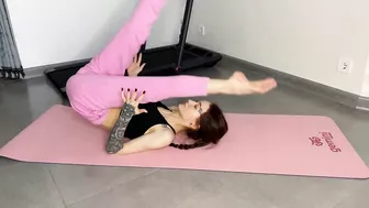 MIDDLE SPLIT STRETCH. FLEXIBLE CONTORTION GIRL. WORKOUT GYMNASTIC FLEX. YOGA SPLITS STRETCH