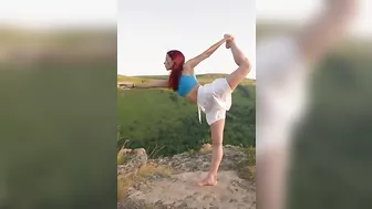 Girl Stretching Yoga Exercises in Mountains Healthy Lifestyle on Zenism Workout Concept Slow Motion